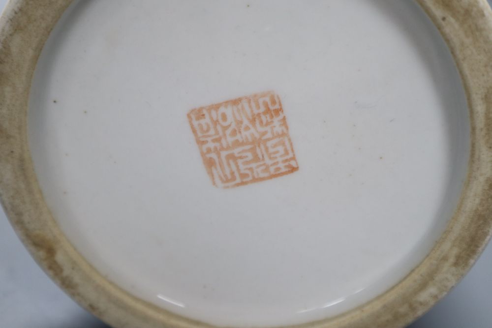 A Chinese cylindrical porcelain brush pot, enamelled with female figures and script, 15cm